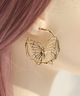 Pendientes de aro con diseño de mariposa hueca y sobredorado en plata de ley y oro de moda